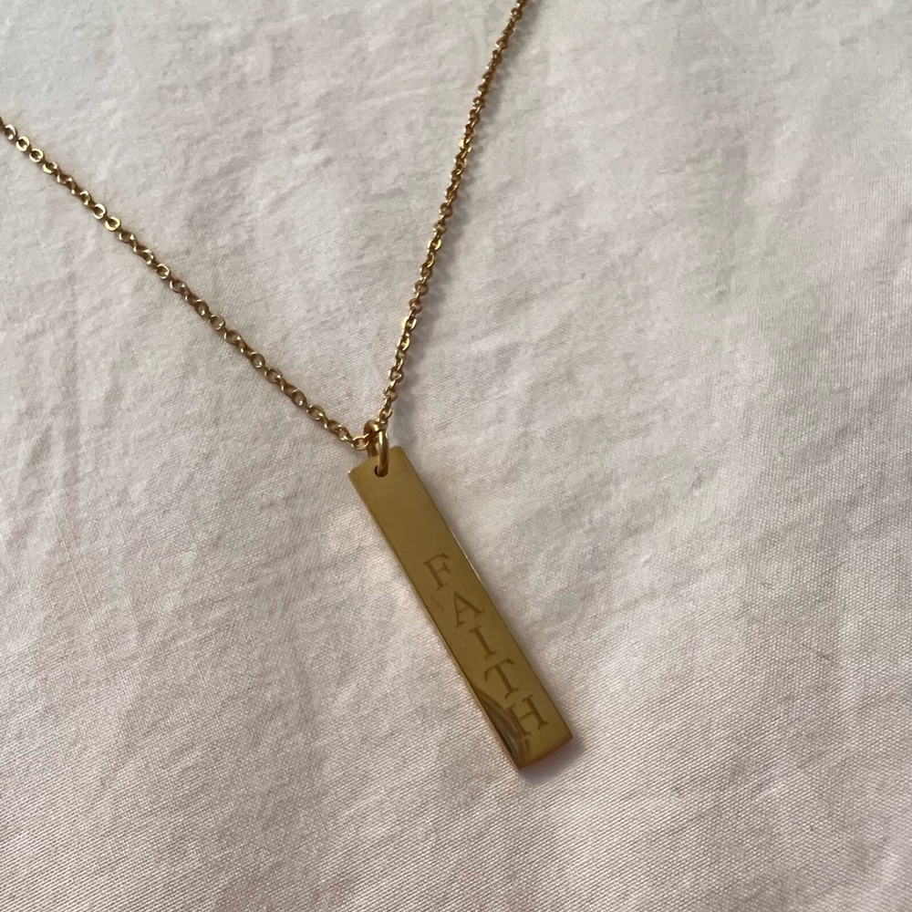 Gold “faith” necklace